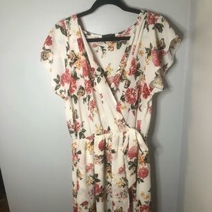 Scobe plus size wrap style dress.